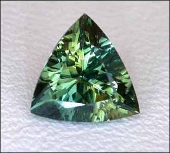 PARTICOLOR SAPPHIRE (AFRICA) -- 0.73 CT. TRILLION